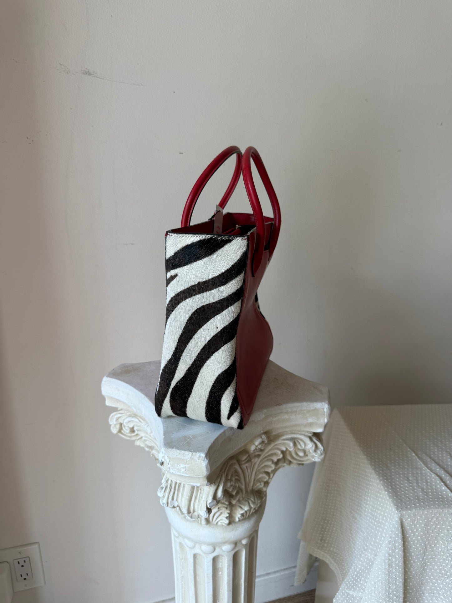 Red and zebra print bag